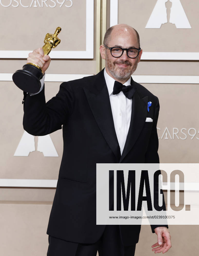 Edward Berger, winner of the award for Best International Feature Film for All Quiet on the Western Front, appears backstage with his Oscar during the 95th annual Academy Awards at Loews Hollywood Hotel in the Hollywood section of Los Angeles on Sunday, March 12, 2023. LAP202303128128 JohnxAngelillo