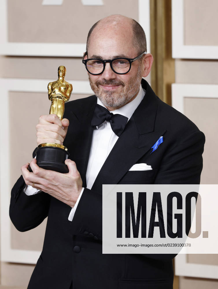 Edward Berger, winner of the award for Best International Feature Film for All Quiet on the Western Front, appears backstage with his Oscar during the 95th annual Academy Awards at Loews Hollywood Hotel in the Hollywood section of Los Angeles on Sunday, March 12, 2023. LAP202303128129 JohnxAngelillo