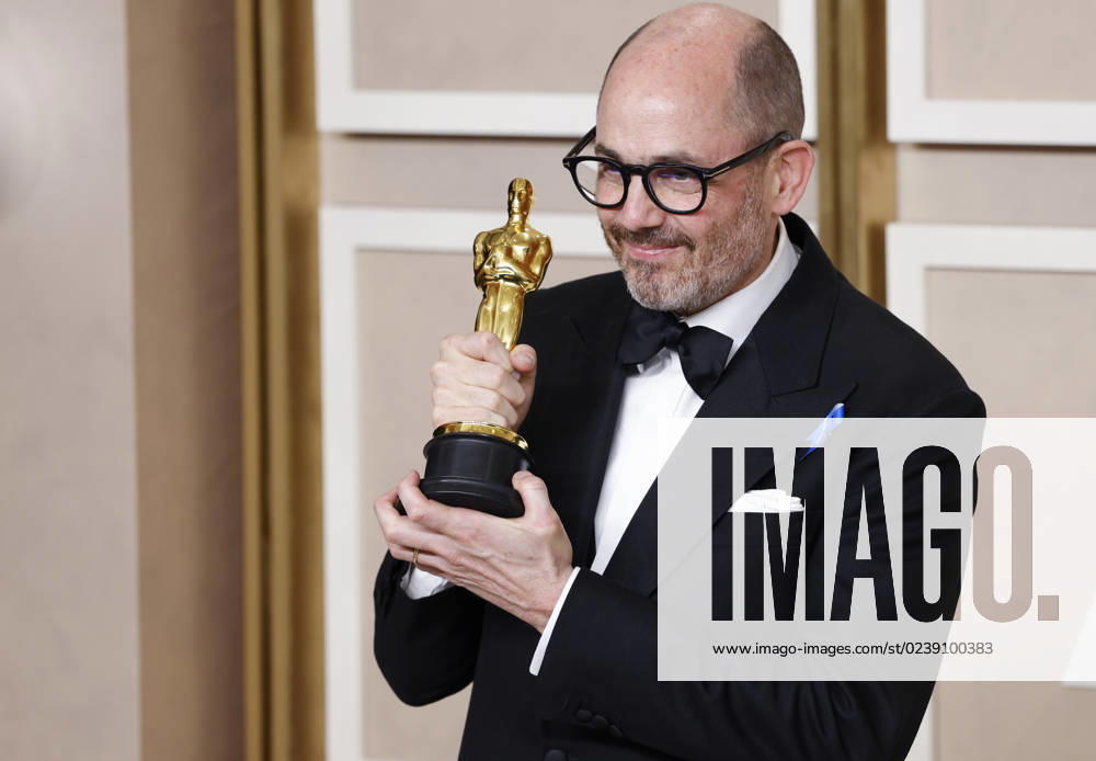 Edward Berger, winner of the award for Best International Feature Film for All Quiet on the Western Front, appears backstage with his Oscar during the 95th annual Academy Awards at Loews Hollywood Hotel in the Hollywood section of Los Angeles on Sunday, March 12, 2023. LAP202303128130 JohnxAngelillo