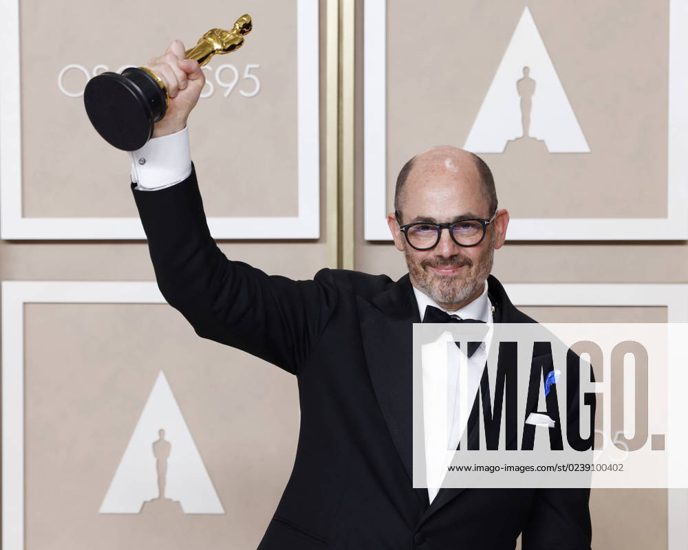 Edward Berger, winner of the award for Best International Feature Film for All Quiet on the Western Front, appears backstage with his Oscar during the 95th annual Academy Awards at Loews Hollywood Hotel in the Hollywood section of Los Angeles on Sunday, March 12, 2023. LAP202303128124 JohnxAngelillo
