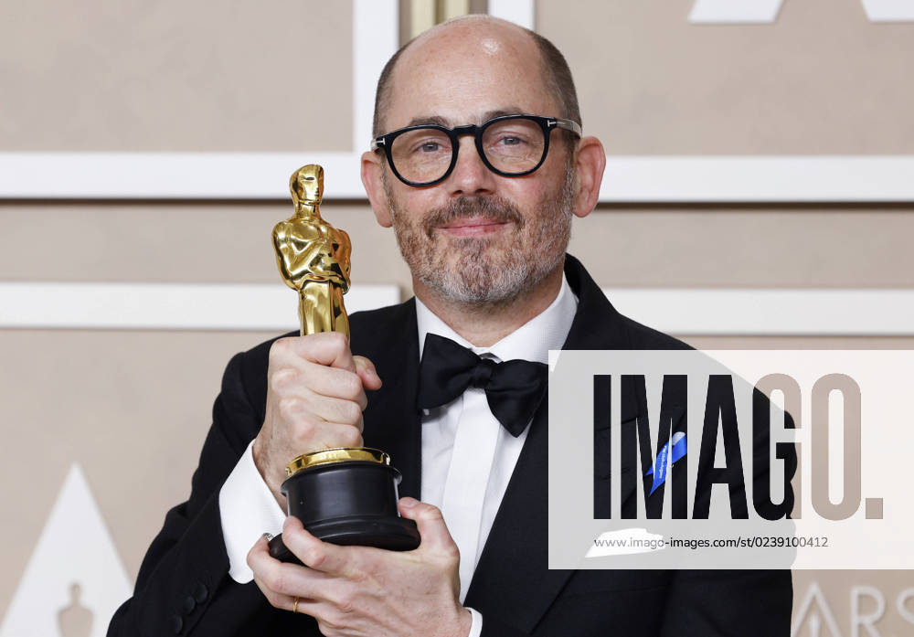 Edward Berger, winner of the award for Best International Feature Film for All Quiet on the Western Front, appears backstage with his Oscar during the 95th annual Academy Awards at Loews Hollywood Hotel in the Hollywood section of Los Angeles on Sunday, March 12, 2023. LAP202303128126 JohnxAngelillo