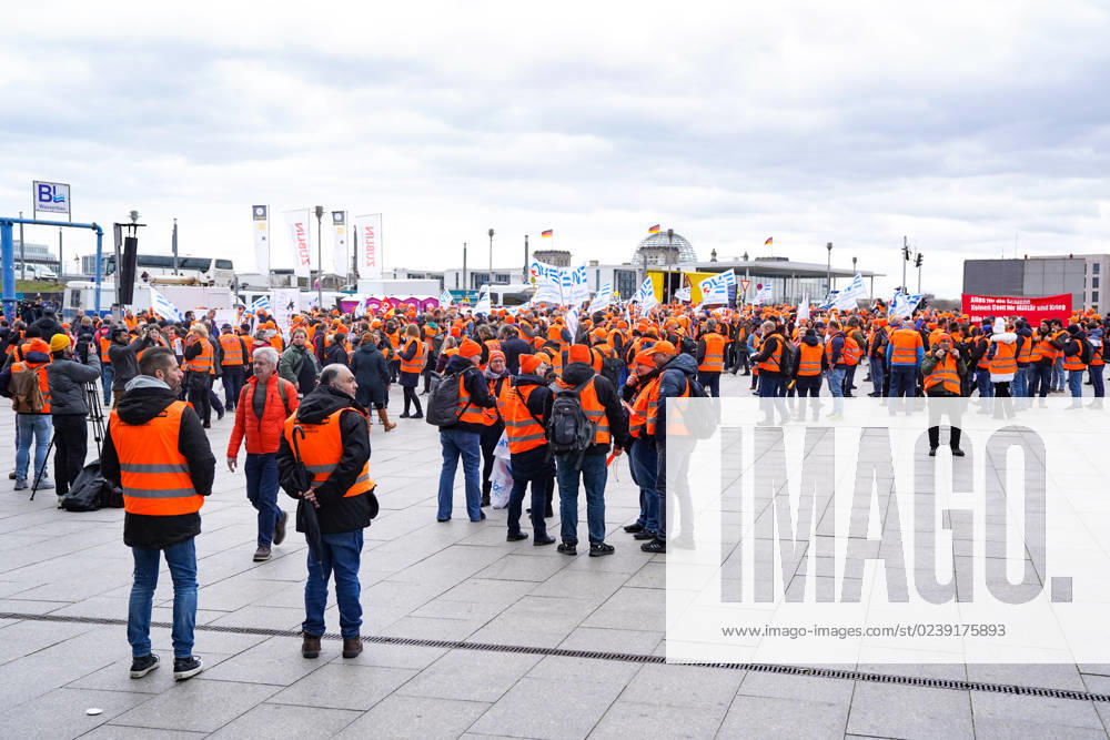 Berlin, Germany 14 March 2023 demonstration of the EVG in front of the Berlin central station, in the background the Reichstag building Federal Chancellery Berlin