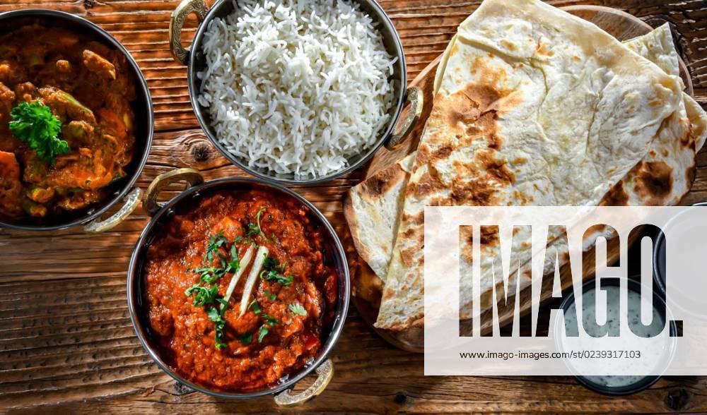 IMAGO Creative, Food, Brot, Naan Hot madras paneer and vegetable masala with rice, Hot madras paneer and vegetable masala with basmati rice served in original indian karahi pots., Hot madras paneer and vegetable masala with basmati rice served in original indian karahi pots., 12.02.2023,