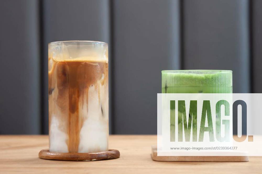 Iced coffee latte and iced matcha greentea on wooden table, Iced coffee latte and iced matcha greentea on wooden table, stock photo, Iced coffee latte and iced matcha greentea on wooden table, stock photo, 15.02.2023,