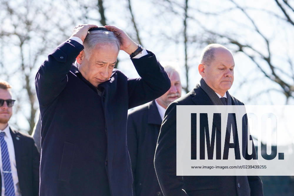 Berlin, Germany 16 March 2023 Visit to the memorial track 17 in Berlin Grunewald 16 03 2023 In the picture from left Benjamin Netanyahu, Prime Minister of Israel, Chancellor Olaf Scholz SPD , Benjamin Netanyahu puts his kippa on memorial track 17 Berlin