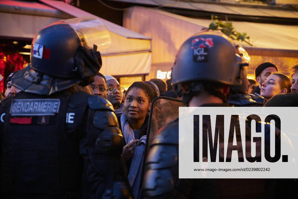 French riot police surround a group of people that wanted to protest near the commercial shopping center of Les Halles in the center of Paris. Paris has seen protests since the governement of Emmanuel Macron pushed the highly contested pension reform through the French parliament without the need for a majority vote, in effect bypassing them. Prime minister Elisabeth Borne has decided to bypass the lower house as the government thought it might not have a guaranteed majority, putting in doubt adopting the controversial law. Paris FRANCE - ZUMAh172 20230319_zip_h172_001