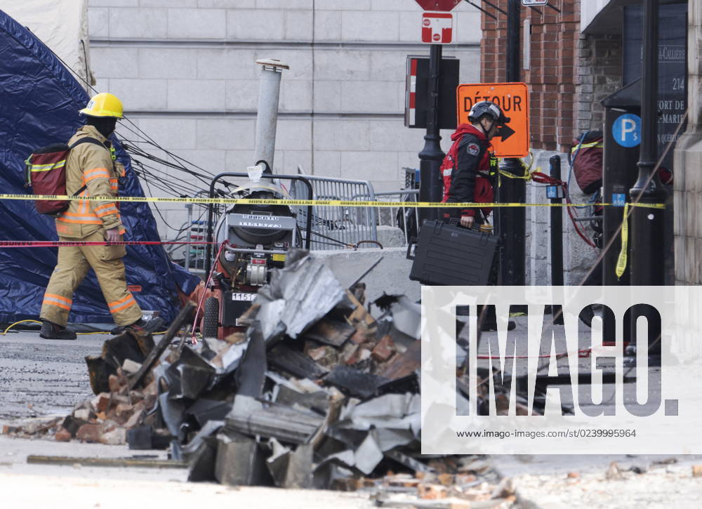 Firefighters continue the search for victims Tuesday, March 21, 2023 at the scene of last weeköÄÃ s fire that left one person dead and six people missing in Montreal. Montreal Canada - ZUMAc35_ 20230320_zaf_c35_068