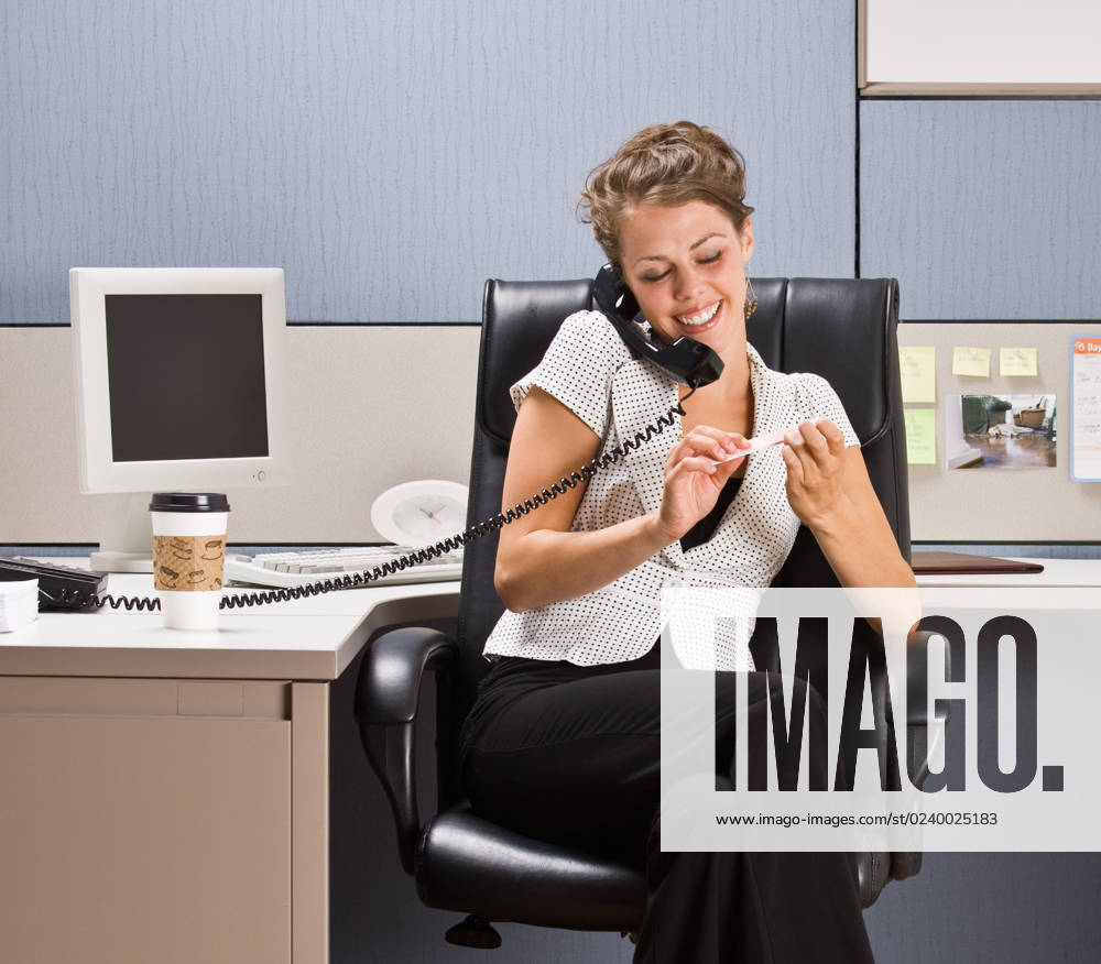 Businesswoman talking on telephone