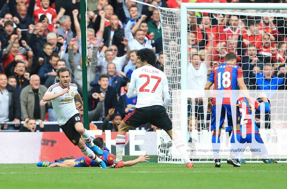 Manchester United ManU s Juan Mata celebrates scoring his sides opening goal during the Emirates FA Cup Final match at Wembley Stadium. Photo credit should read: David Klein Sportimage .