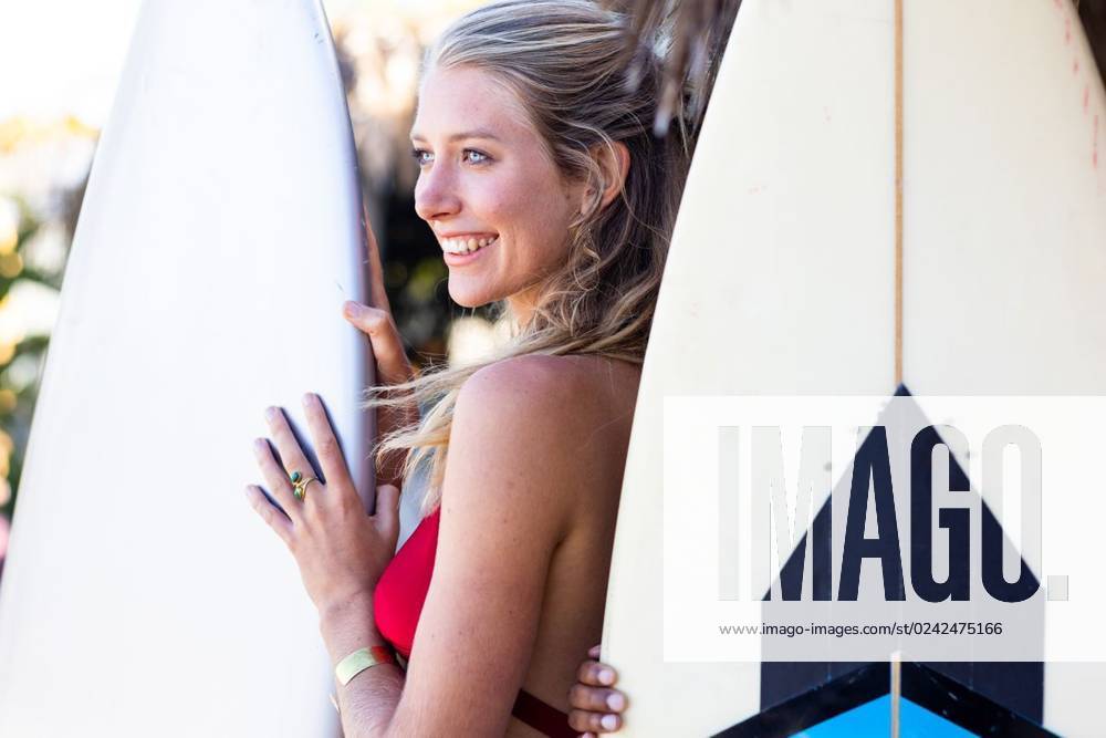 Happy caucasian woman holding surfboard at beach Happy caucasian woman holding surfboard at beach. Spending quality time, lifestyle, friendship, summertime and vacation concept., model released, , property released, Cape Town, South Africa, 21.02.2023, 3976698.jpg, people,happy,caucasian woman,holding,surfboard,beach,spending,quality time,lifestyle,friendship,party,summertime,vacation,concept,young,sea,ocean,person,fun,holiday,leisure,summer,coast,adult,happiness,beautiful,sand,travel,smile,cheerful,surfer,water,together,caucasian,woman,quality,time Young Adult,Woman,Female,White