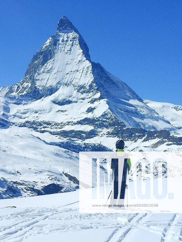 Zermatt, Matterhorn themed picture skiing, skiers on ski slopes in the alpine region Zermatt, Matterhorn, Valais, Switzerland themed picture skiing, skiers on ski slopes in the alpine region Zermatt, Matterhorn, Valais, Switzerland, Saas Fee skiing, alpine skiing on wide ski sl