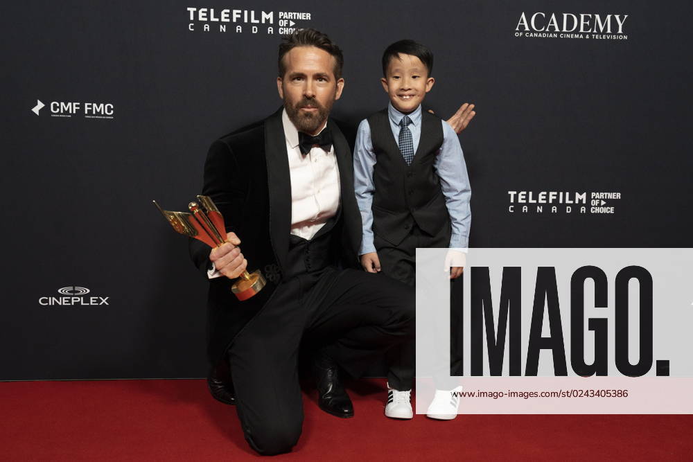 Ryan Reynolds poses with Everett Ho, a Sick Kids hero, after receiving the Humanitarian Award at the Comedy and TV Drama awards evening at the Canadian Screen Awards, in Toronto, on Friday, April 14, 2023. Toronto Canada - ZUMAc35_ 20230414_zaf_c35_137