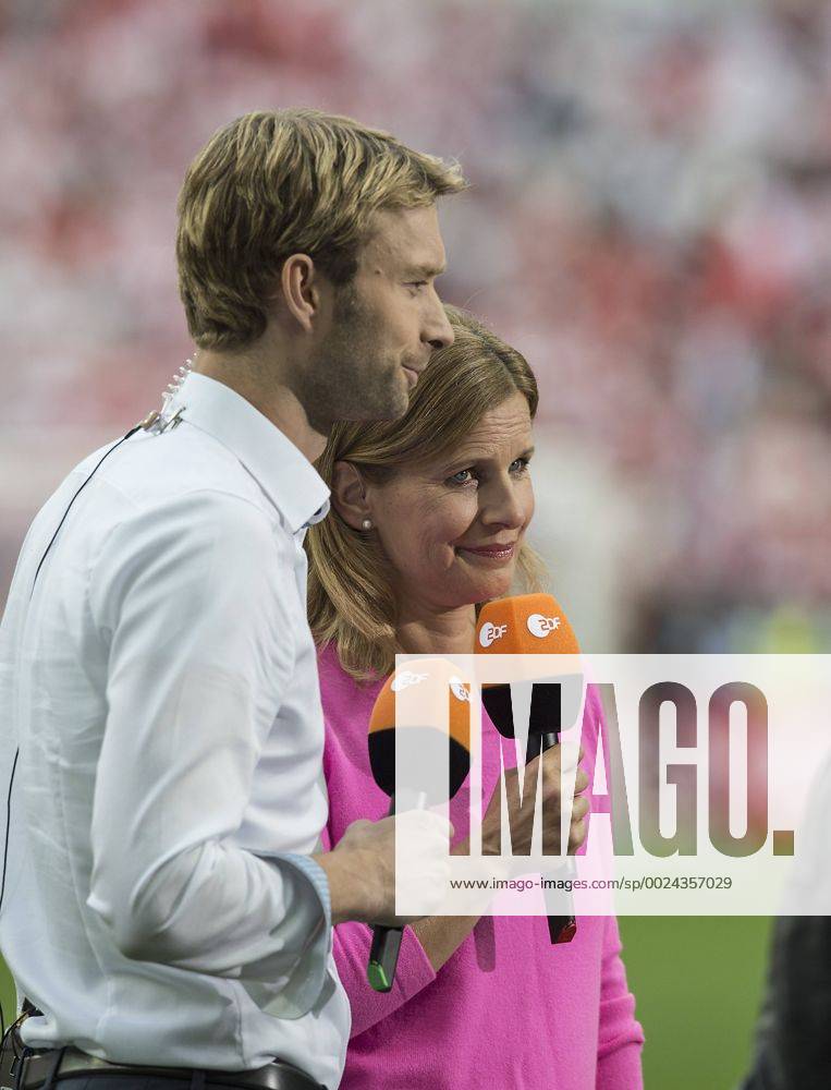 Katrin MUELLER-HOHENSTEIN, Müller-Hohenstein, ZDF Sportmoderatorin, Fernsehmoderatorin, mit Simon ROLFES l. (ehemaliger Fussballspieler). Vorrunde Gruppe C, Spiel M18, Deutschland (GER) - Polen (POL) 0:0, am 16.06.2016 in Saint Denis. Fussball EM 2016 in Frankreich vom 10.06.