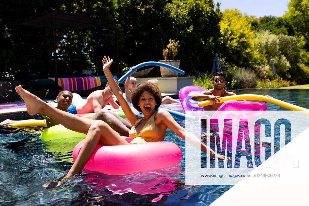 Happy diverse group of friends having pool party, using swim rings in swimming pool in garden Happy diverse group of friends having pool party, using swim rings in swimming pool in garden. Lifestyle, friendship, party and summer., model released, , property released, Cape Town, South Africa, 2023-01-25T22:00:00.000Z, 4017959.jpg, people,happy,diverse group,friend,pool party,using,swim ring,swimming pool,garden,lifestyle,friendship,summer,young,beautiful,nature,person,fun,outdoor,adult,leisure,smile,spring,happiness,cheerful,beauty,portrait,green,together,cute,plant,smiling,diverse,group,pool,party,swim,ring,swimming Young Adult,Man,Male,Multiracial,White,Woman,Female,Hispanic or Latino,Non-binary
