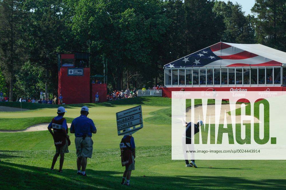 Rickie Fowler hits his approach to the seventeenth green during third round play at the Quicken Loans National at Congressional Country Club in Bethesda MD. PGA Golf Herren 2016: Quicken Loans National JUN 25 - ZUMAcjm_