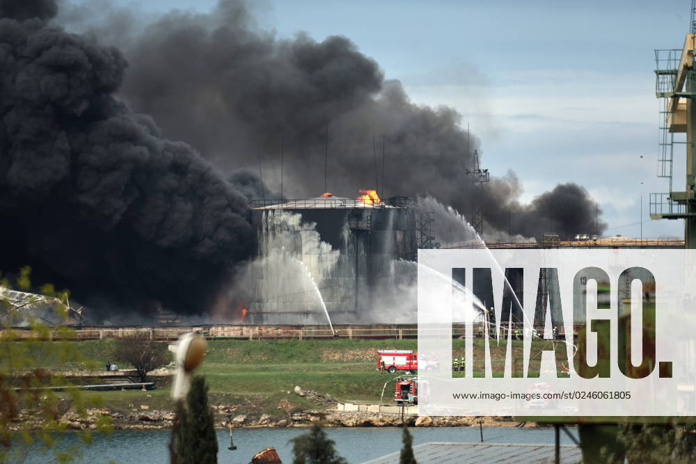 RUSSIA, SEVASTOPOL - APRIL 29, 2023: Firefighters battle a fire at an oil depot in Sevastopol s Kazachya Bukhta neighborhood. According to preliminary data, an oil tank has caught fire after a drone attack. According to the city authorities, the fire covers an area of 1,000 sqm. Stringer TASS 58729836