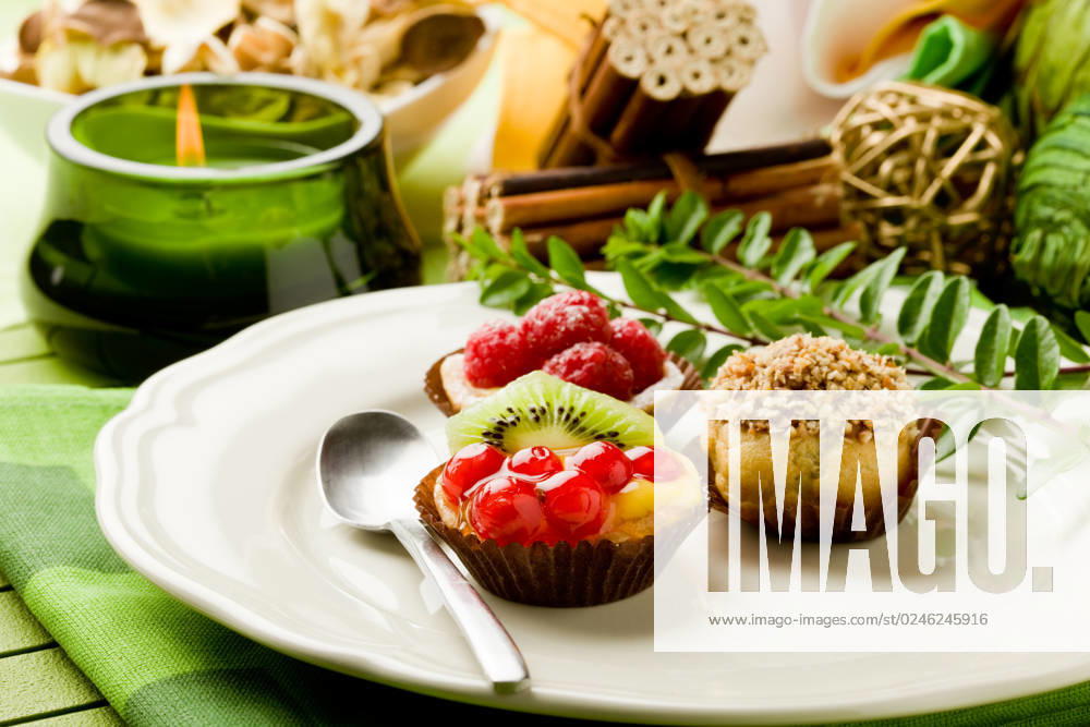 Photo of delicious dessert plate with italian fruits pastries