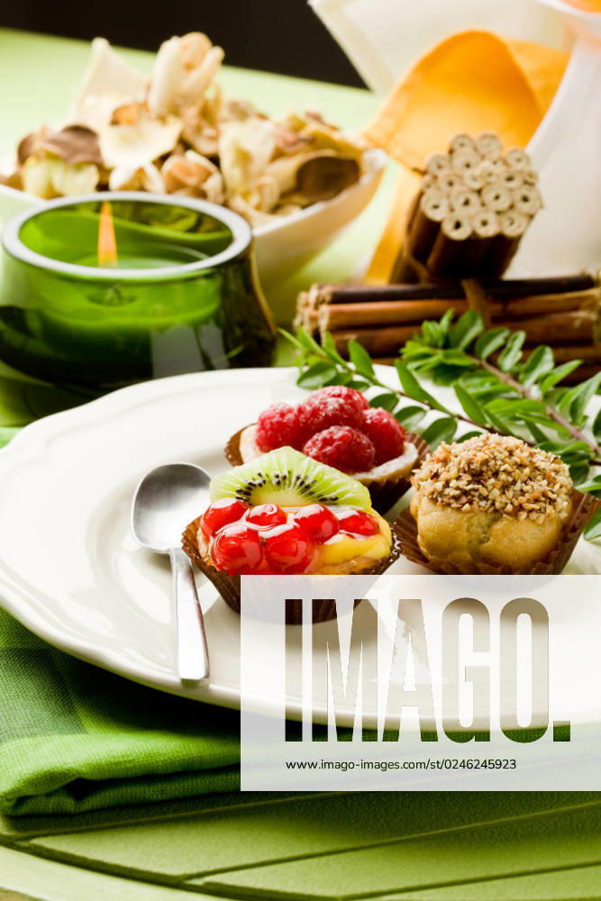Photo of delicious dessert plate with italian fruits pastries