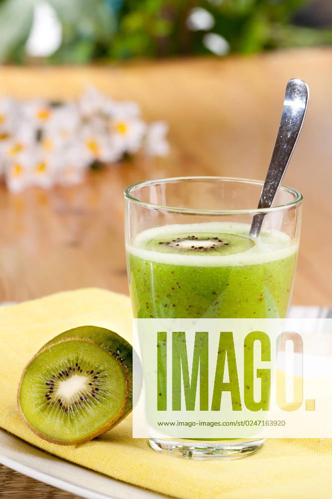 A tasty kiwi smoothie in a natural setting