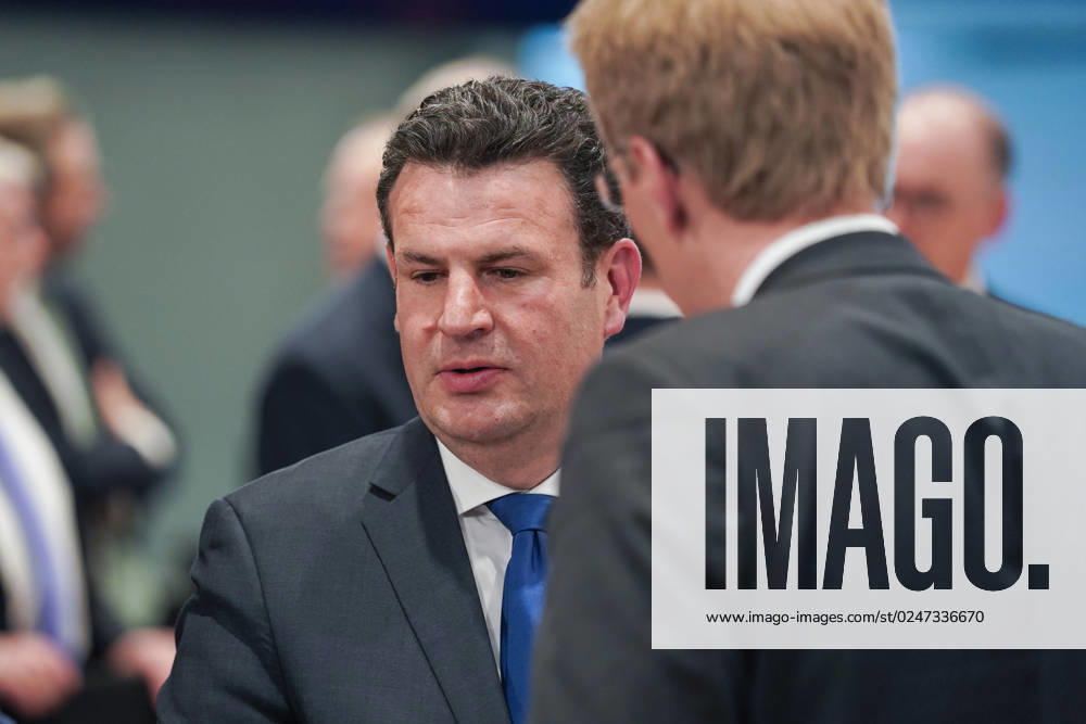 Berlin, Germany 10 May 2023 Minister Presidents Conference on the refugee issue in Berlin 10 05 2023 In the picture Hubertus Heil, Federal Minister of Labor and Social Affairs SPD li in conversation with Daniel Günther, Minister President of Schleswig Holstein CDU Federal Chancellery Berlin
