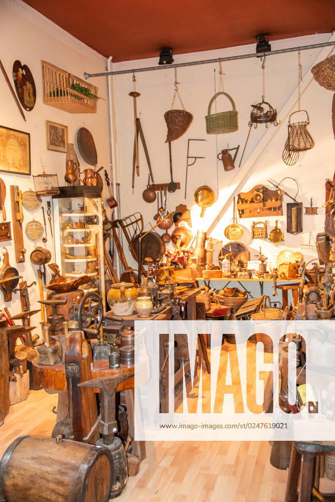 Paris, France. August 2022. One of the many antique shops at the Saint Quen flea market in Paris. Paris, France. August 2022. One of the many antique shops at the Saint Quen flea market in Paris. High quality photo