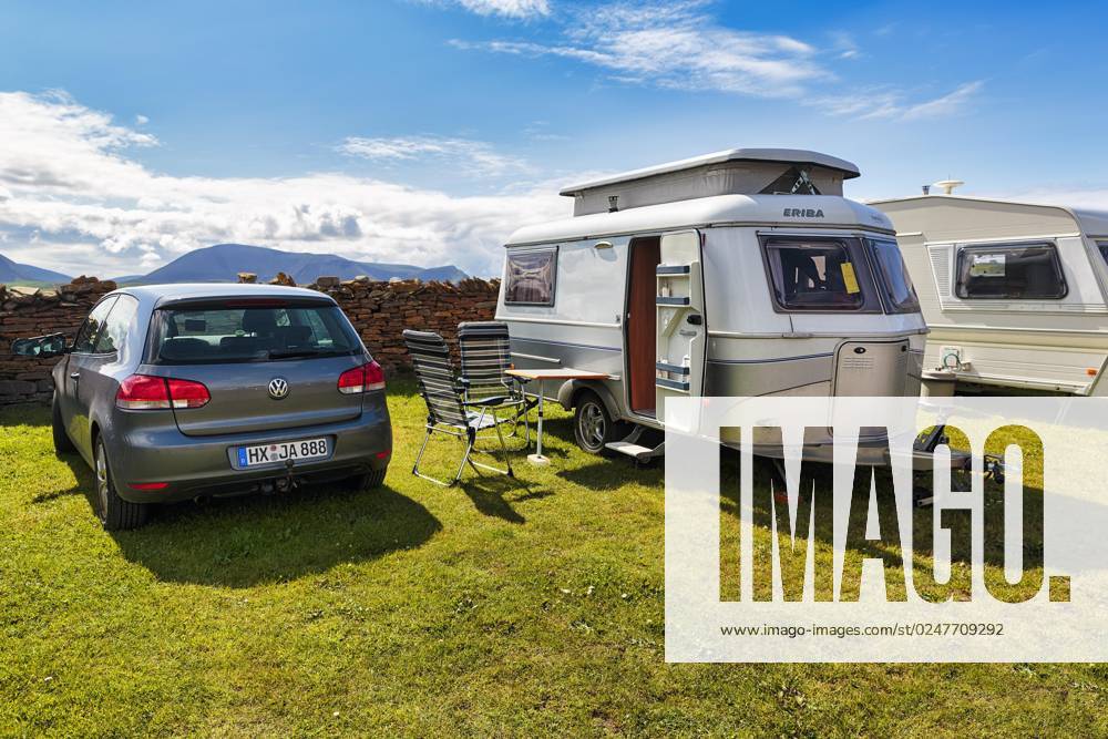 Car with Eriba Touring, Hubdach Caravan, Cult, retro, at Campsite at Summer, sunny Weather, Mainland, Orkney Islands, Scotland, Great Britain, Europe