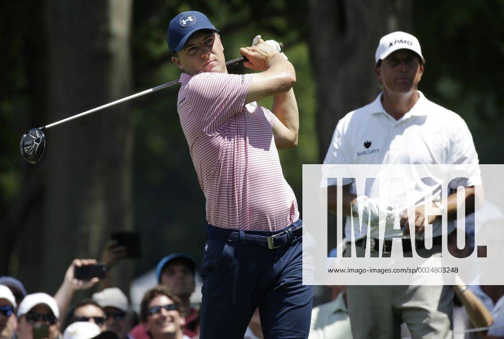 Phil Mickelson watches Jordan Spieth tee off in a practice round at the PGA Golf Herren Championship at Baltusrol Golf Club in Springfield, New Jersey on July 26, 2016. PGA20160726115 JOHNxANGELILLO