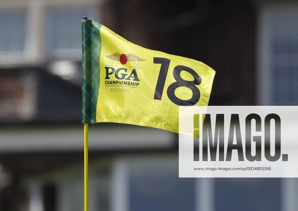 The Flag on the 18th green moves in the wind in a practice round at the PGA Golf Herren Championship at Baltusrol Golf Club in Springfield, New Jersey on July 26, 2016. PGA20160726110 JOHNxANGELILLO