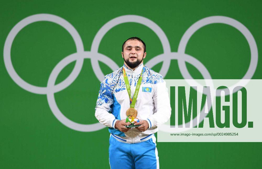 (160810) -- RIO DE JANEIRO, Aug. 10, 2016 -- Gold medalist Nijat Rahimov of Kazakhstan attends the awarding ceremony of the men s 77kg weightlifting final at the 2016 Rio Olympic Games Olympische Spiele Olympia OS in Rio de Janeiro, Brazil, on Aug. 10, 2016. ) (xr) (SP)BRAZIL-RIO DE JANEIRO-OLYMPICS-WEIGHTLIFTING ChengxMin
