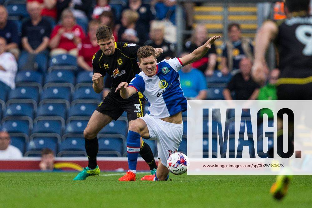 Ewood Park, Blackburn, England. EFL Cup Football. Blackburn Rovers versus Crewe Alexandra. Blackburn Rovers forward Sam Gallagher and Crewe Alexandra defender Jon Guthrie challenge for the ball. Williamsx ActionPlus11779469