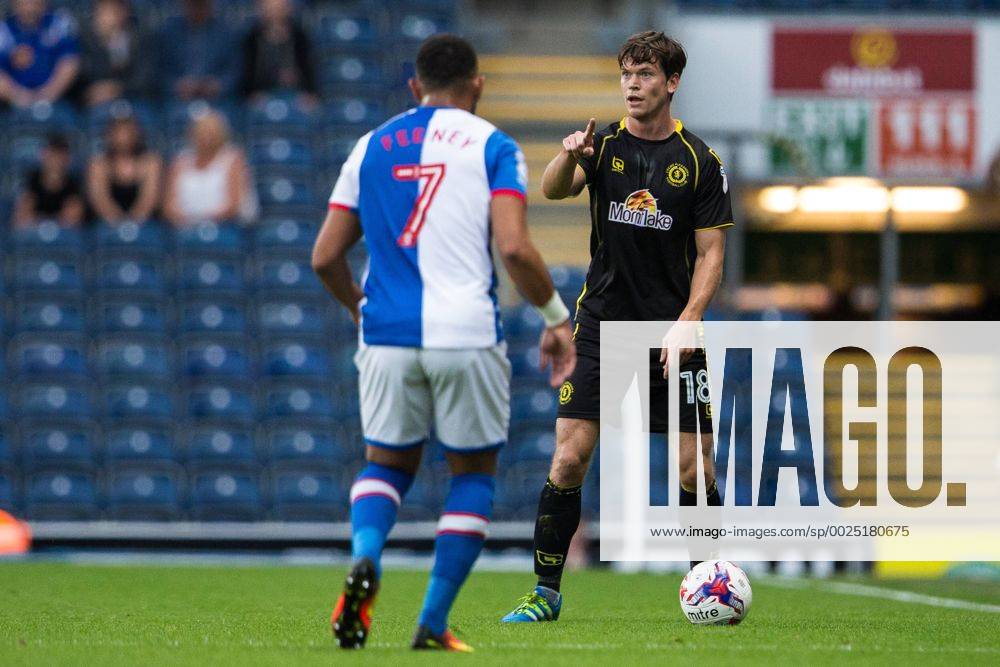 Ewood Park, Blackburn, England. EFL Cup Football. Blackburn Rovers versus Crewe Alexandra. Crewe Alexandra midfielder Billy Bingham points to space as he is closed down by Blackburn Rovers midfielder Liam Feeney. Williamsx ActionPlus11779471