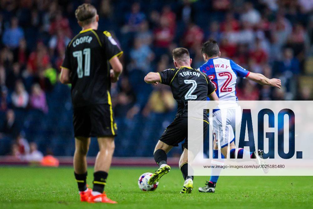 Ewood Park, Blackburn, England. EFL Cup Football. Blackburn Rovers versus Crewe Alexandra. Blackburn Rovers midfielder Craig Conway challenges Crewe Alexandra defender Oliver Turton watched by Crewe midfielder George Cooper. Williamsx ActionPlus11779516