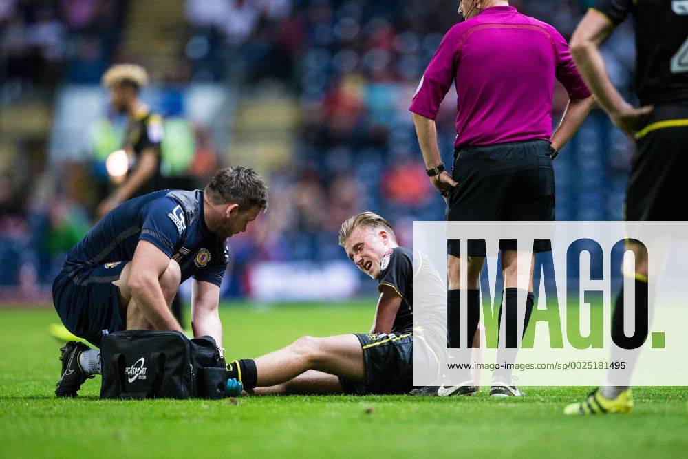 Ewood Park, Blackburn, England. EFL Cup Football. Blackburn Rovers versus Crewe Alexandra. Crewe Alexandra midfielder George Cooper receives treatment. Williamsx ActionPlus11779526