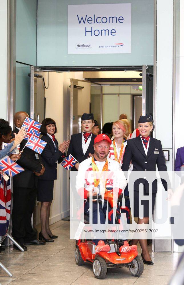 London, London, UK - London, UK. Team GB Paralympian Lee Pearson arrives at terminal 5 of London Heathrow Airport after flying on British Airways flight BA2016. Team GB finished second in the Paralympics medals table with 147 medals beating their total of 120 at London 2012. Paralympians Return Home - ZUMAl94_