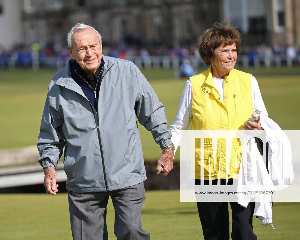 Arnold Palmer (L) seen with his wife Kathleen Gawthrop in this July 15, 2015 file photo from the the144th Open Championship at St.Andrews, died today, September 25, 2016, at 87 according to a USGA statement. The seven-time major winner was known as the king of golf and given credit for bringing the to the masses. File WAX20160925302 KEVINxDIETSCH