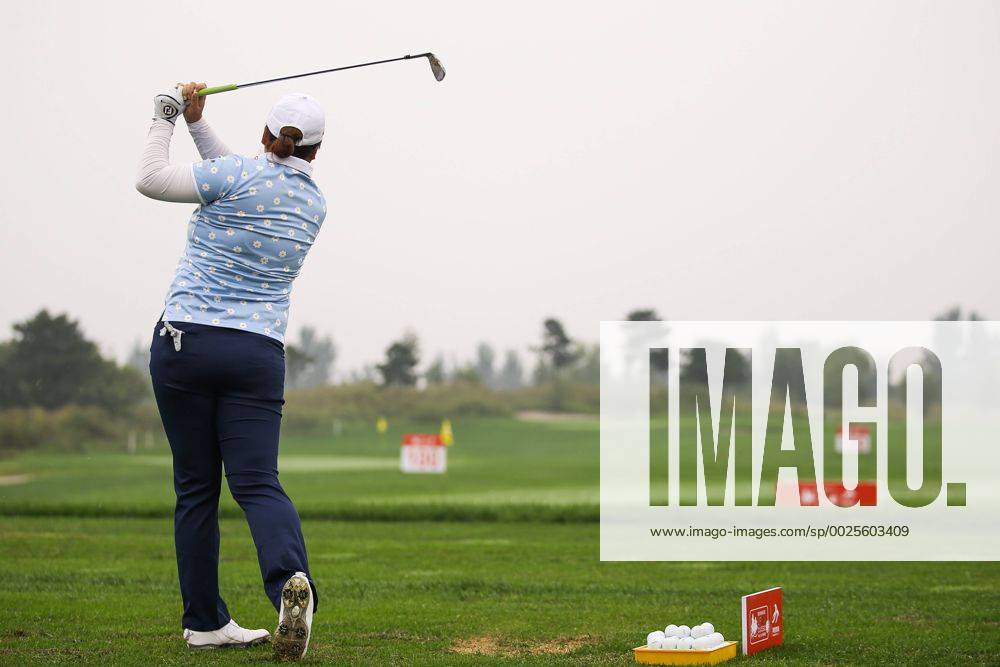 Feng Shanshan of China swings the club during a training session on Day one of 2016 Reignwood LPGA Golf Damen Classic at Reignwood Pine Valley on September 26, 2016 in Beijing, China. CFP492737102