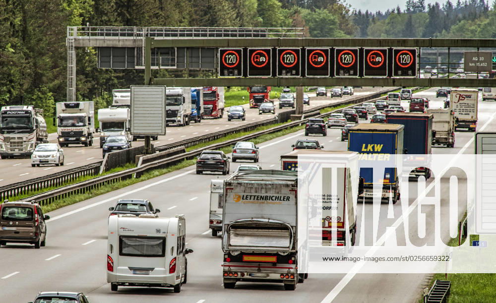 A8 freeway, Munich Salzburg, southbound tourist traffic, heavy traffic before long weekend, Sauerlach, 17 May 2023 Germany, Sauerlach near Munich, 17 May 2023, heavy tourist traffic on the A8 freeway Munich Salzburg southbound right , before the long Ascension weekend with bridge day, sign gantry shows speed