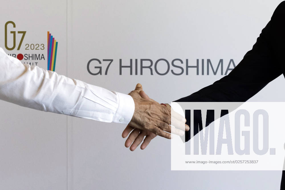 Britain s Prime Minister Rishi Sunak (R) shake hands with Indian Prime Minister Narendra Modi as he attends the G7 Summit on Sunday, May 21, 2023, during the final day of a three-day G-7 summit in Hiroshima, Japan. The final day of the three-day of the Group of Seven leaders summit is under way in the western Japan city of Hiroshima, with focus on Ukrainian President Volodymyr Zelensky and his talks with international leaders. JAP2023052159 Nox10xDowningxStreet