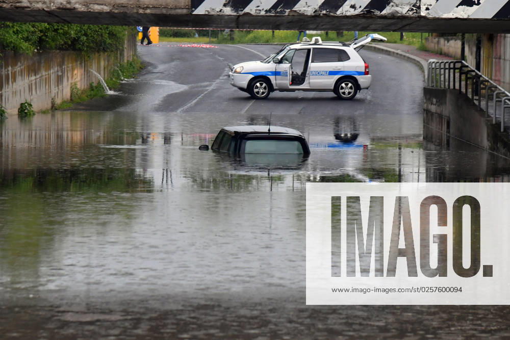 Rieti, 23 May 2023. A violent storm hit Rieti this afternoon, causing flooding of cellars and garages and disruption to traffic. The underpass near the police station in which a car was blocked was flooded, except for the people who were inside. Rieti, May 23, 2023. A violent cloudburst hit Rieti this afternoon causing flooding of cellars and garages and disruption to the road system. Flooded the underpass near the Police Headquarters in which a car was stranded, saving the people inside.