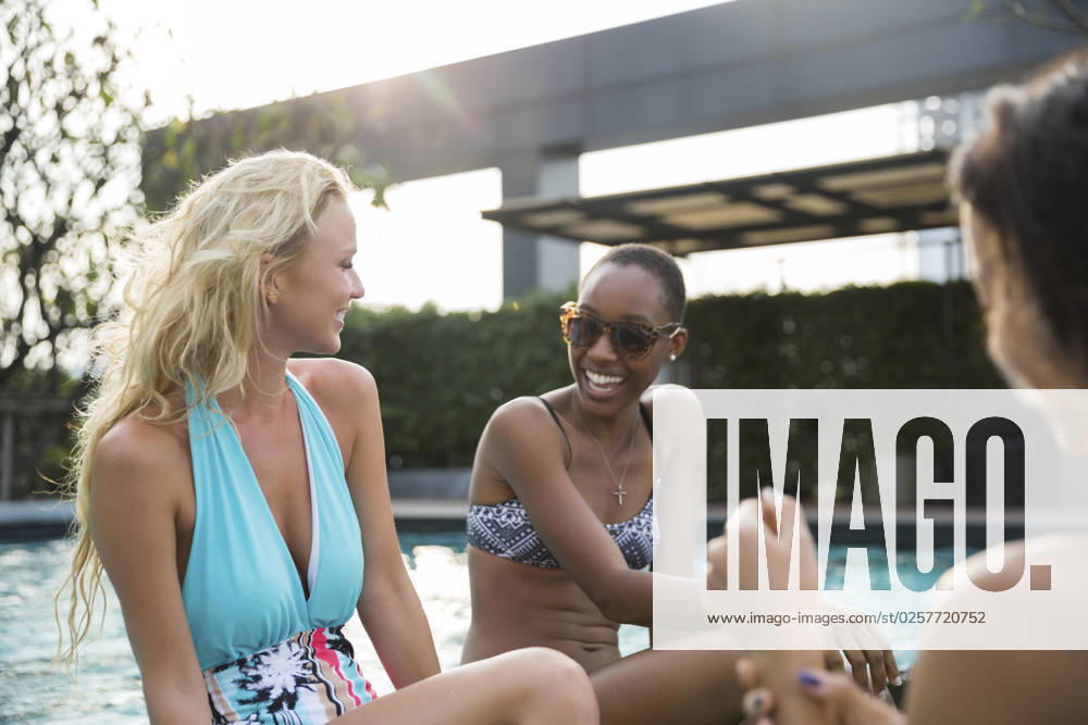 Happy multiracial friends having fun at resort model released, Symbolfoto, IKF00439