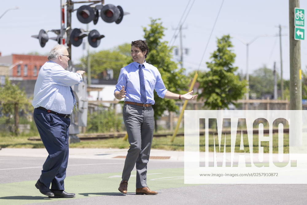 Prime Minister Justin Trudeau walks with mayor Joseph Preston to The Atrium in St. Thomas, Ont., on Thursday, May 25, 2023. St. Thomas Canada - ZUMAc35_ 20230525_zaf_c35_037