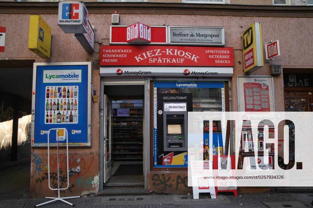 Spätkauf with Cash dispenser in Berlin Kreuzberg, Germany, Advertising for Lycamobile, MoneyGram on 13 02 2016