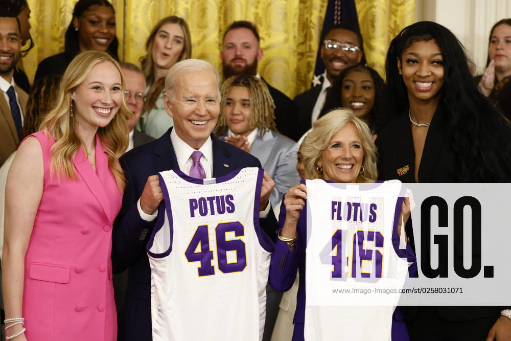 President Joe Biden and first lady Jill Biden display their jerseys during an event with the Louisiana State University (LSU) women s basketball team in the East Room at the White House in Washington, DC on Friday, May 26, 2023. The event is celebrating the LSU Tigers winning the 2022-2023 NCAA championship. Tigers Angel Reese is at right and Emily Ward at left. WASP20230526102 SamuelxCorum