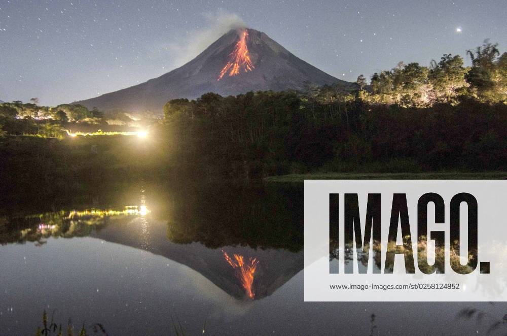 (230528) -- MAGELANG, May 28, 2023 -- This long exposure photo shows volcanic materials spewing from Mount Merapi volcano, as seen from Srumbung village in Magelang, Central Java, Indonesia, on May 28, 2023. (Photo by Xinhua) INDONESIA-MAGELANG-MOUNT MERAPI-ERUPTION AgungxSupriyanto