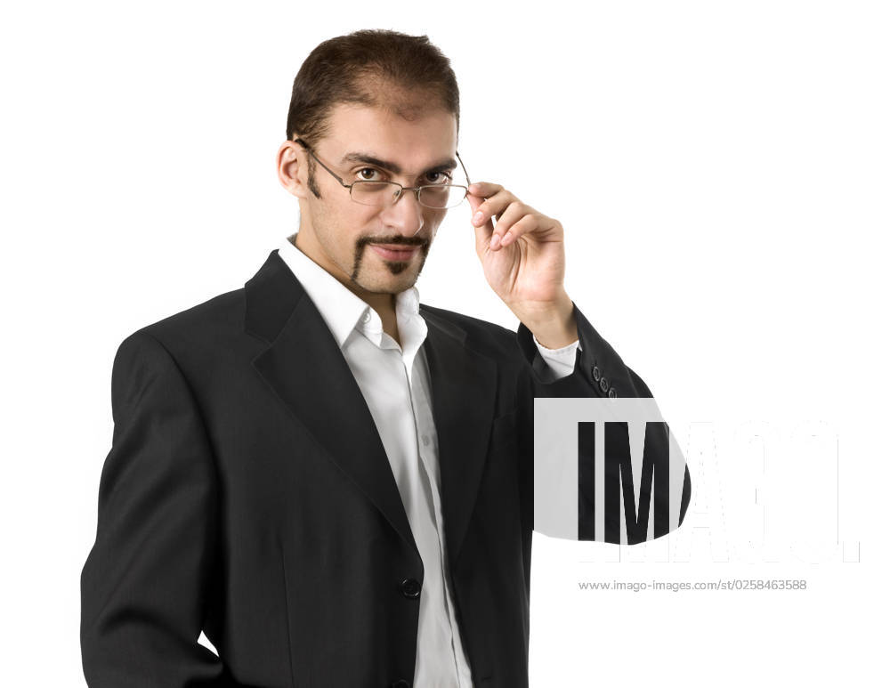 Portrait of a young businessman standing against isolated white background