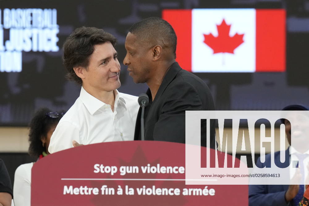 Prime Minister Justin Trudeau greets Toronto Raptors president Masai Ujuri after speaking about gun violence, at the OVO Athletic Centre in Toronto on Thursday, June 1, 2023. TORONTO CANADA - ZUMAc35_ 20230601_zaf_c35_145