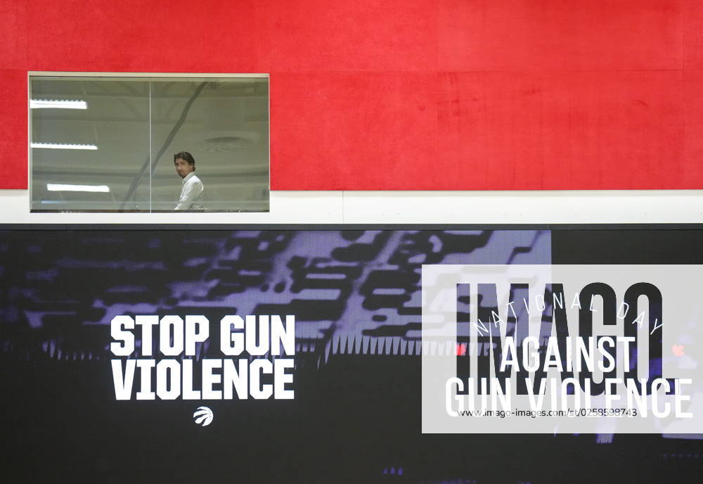Prime Minister Justin Trudeau is pictured in a window as he walks to meet with teenagers and families before announcing that every first Friday in June will be National Day Against Gun Violence at the OVO Athletic Centre in Toronto on Thursday, June 1, 2023. TORONTO CANADA - ZUMAc35_ 20230601_zaf_c35_149