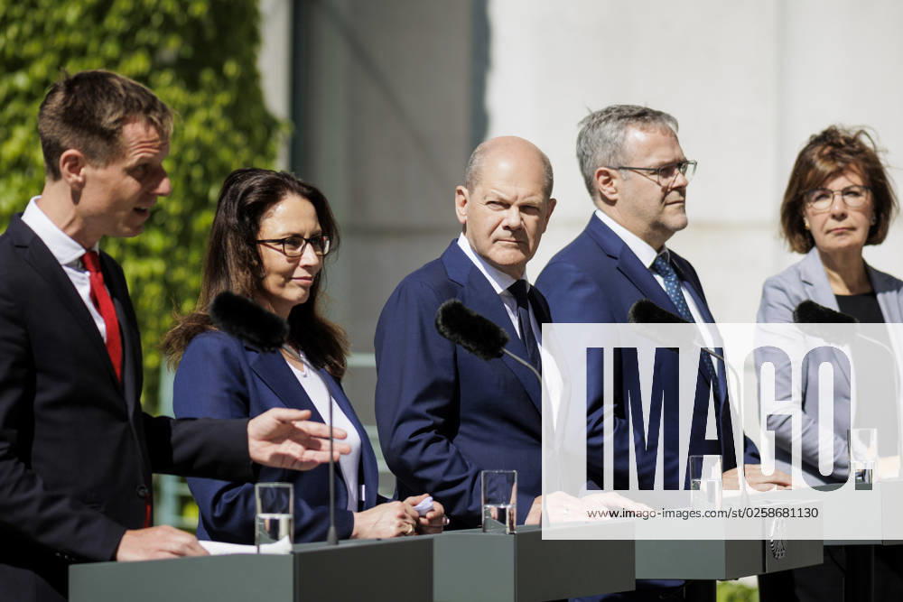 Kai Niebert, President of Deutscher Naturschutzring, Yasmin Fahimi, Chair of the German Federation of Trade Unions, Chancellor Olaf Scholz SPD , Joerg Dittrich, President of the German Confederation of Skilled Crafts, and Marie Luise Wolf, President of the German Association of Energy and Water Indust