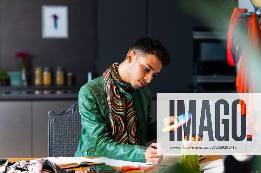 Biracial transgender fashion designer sitting at desk holding colour palette and drawing sketches Biracial transgender fashion designer sitting at desk holding colour palette and drawing sketches. Gender, fashion, design and lifestyle, unaltered., model released, , property released, Cape Town, South Africa, 2023-04-24T22:00:00.000Z, 4046021.jpg, people,biracial,transgender,fashion designer,sitting,desk,holding,colour,palette,drawing,sketch,gender,lifestyle,unaltered,bisexual,young,person,adult,happy,lgbt,homosexual,lesbian,hand,homosexuality,education,transsexual,draw,laptop,portrait,pencil,office,smiling,casual,fashion,designer,design Young Adult,Man,Male,Hispanic or Latino