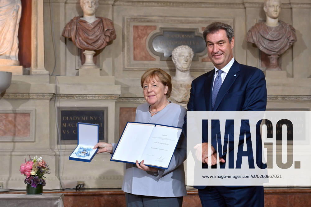 Markus SOEDER Prime Minister of Bavaria and CSU Chairman with Angela MERKEL Award of the Bavarian Order of Merit to Chancellor a D Dr Angela Merkel on 21 06 2023 in the Antiquariat of the Residenz in Munich